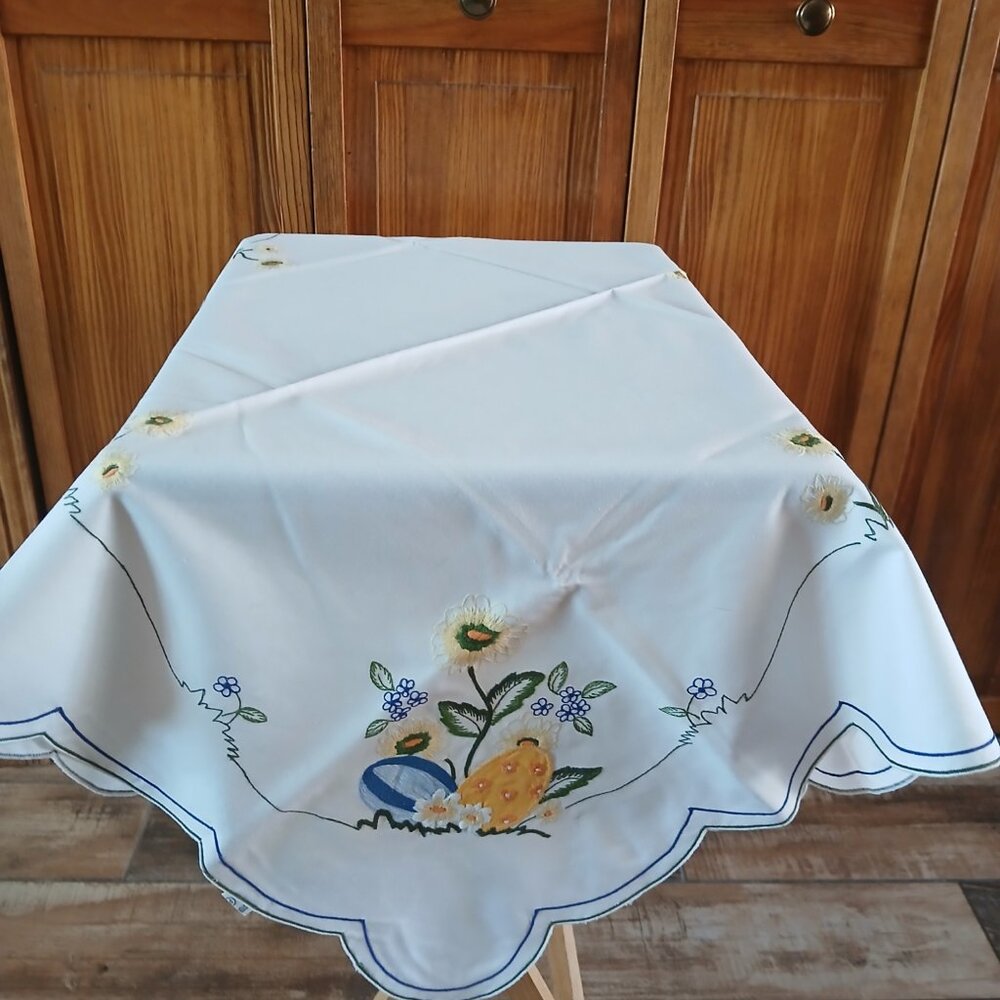Very nice white table topper w/Easter related decoration